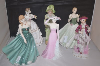 Lot 335 - Group of porcelain figurines including Royal...