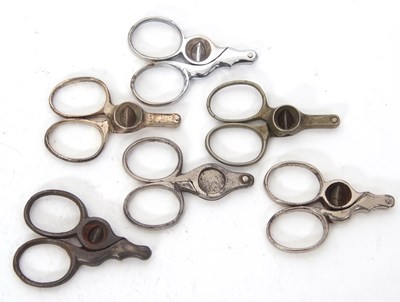 Lot 109 - Six pairs of metal scissor style cigar cutters