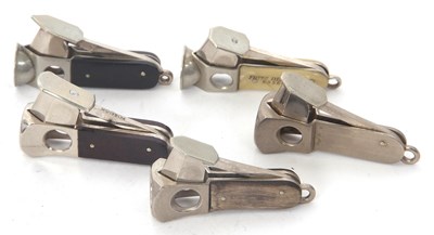 Lot 111 - A group of five vintage German cigar cutters...
