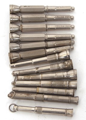 Lot 116 - A group of 13 cigar piercers, six engraved C.W....