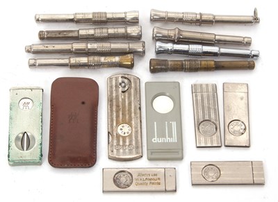 Lot 121 - A group of seven vintage cigar cutters and...