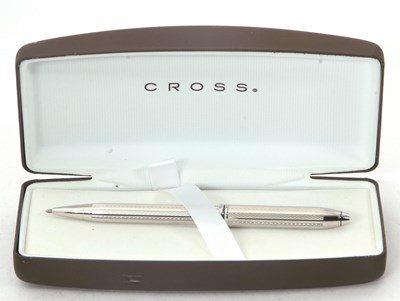 Lot 130 - A cased "Cross" chrome ballpoint pen engraved...