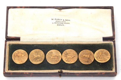 Lot 135 - Cased set of six vintage-brass buttons with...