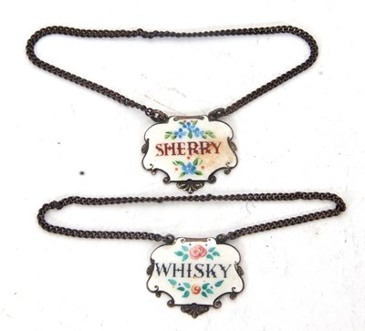 Lot 138 - Two silver and enamel sherry and whisky bottle...