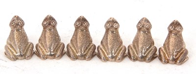 Lot 141 - A set of six frog menu holders stamped Carrs...