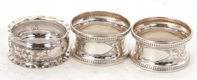 Lot 143 - A cased pair of Edwardian silver serviette...