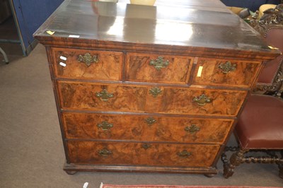 Lot 392 - An 18th Century walnut chest of three short...