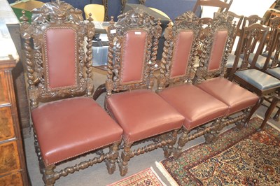 Lot 394 - A set of four Victorian gothic oak dining...