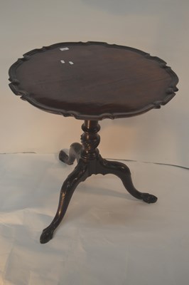 Lot 397 - A Georgian mahogany snap top table, the card...