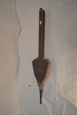 Lot 432 - A Victorian Gothic carved oak fire bellows...