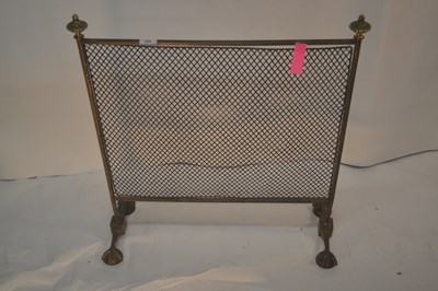 Lot 435 - A 19th Century brass framed spark guard raised...