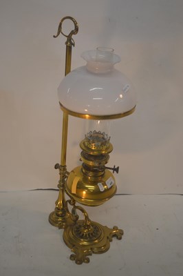 Lot 449 - A Victorian brass adjustable oil lamp fitted...