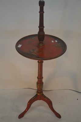 Lot 454 - An early 20th Century red chinoiserie standard...