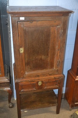 Lot 465 - An 18th Century oak cupboard with single...
