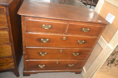 Lot 473 - A Georgian oak chest of two short over three...