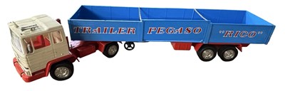Lot 258 - A large plastic lorry and flatbed trailer by Rico
