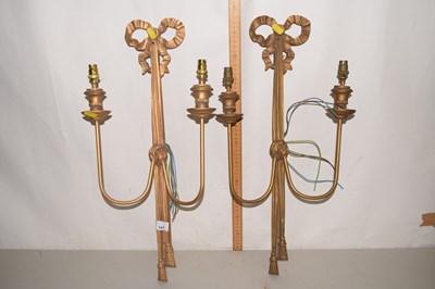 Lot 147 - A pair of modern metal and composition wall...