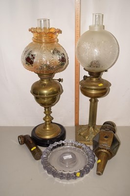 Lot 153 - Two brass based oil lamps, a further small...