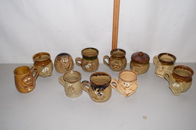 Lot 164 - A collection of Ugly Pottery mugs and similar...