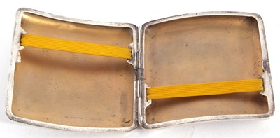 Lot 164 - George V silver cigarette case of shaped...