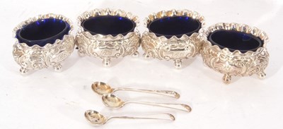 Lot 169 - Set of four late Victorian silver four-footed...