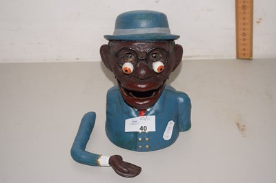 Lot 40 - A novelty iron moneybox