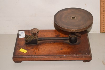 Lot 42 - Vintage brass stand on wooden base