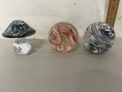 Lot 58 - Three glass paperweights, one formed as a...