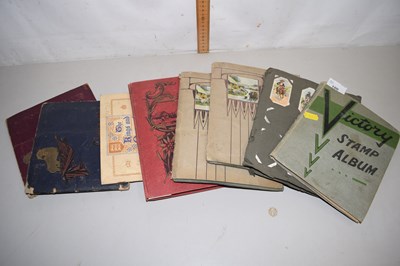 Lot 100 - A junior stamp album together with a range of...