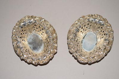 Lot 107 - A pair of small pressed silver bonbon dishes