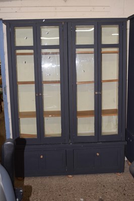 Lot 244 - A 20th Century painted four door display...