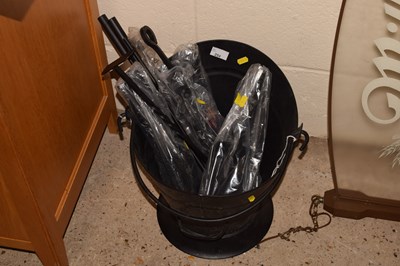 Lot 254 - A coal bucket and as new fire tools