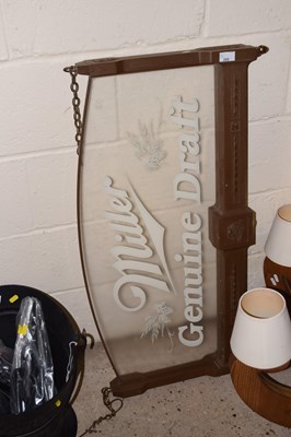 Lot 255 - A glass and wood effect Miller Genuine Draft...