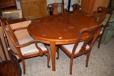Lot 293 - A retro teak dining table together with a set...
