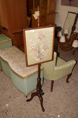 Lot 295 - A needlework pole screen on tripod base