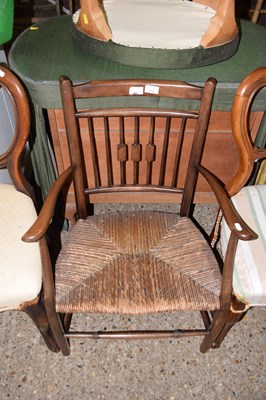 Lot 313 - A Victorian mahogany framed scroll arm and...