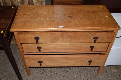 Lot 317 - Early 20th Century light oak three drawer chest
