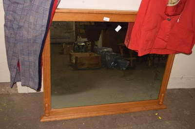 Lot 727 - A pine framed over mantel mirror