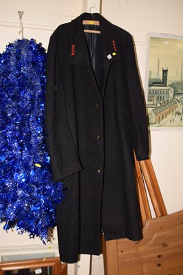 Lot 730 - A black overcoat with gilt buttons