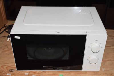Lot 747 - A Hi-sense white framed microwave