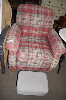 Lot 778 - A plaid armchair and grey footstool