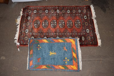 Lot 796 - Small russet ground rug