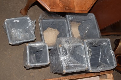 Lot 800 - A set of six graduated plant pots