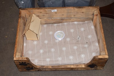 Lot 801 - A rustic dog bed