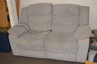 Lot 941 - A two seater reclining sofa