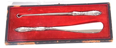 Lot 199 - Victorian cased shoe horn and button hook,...