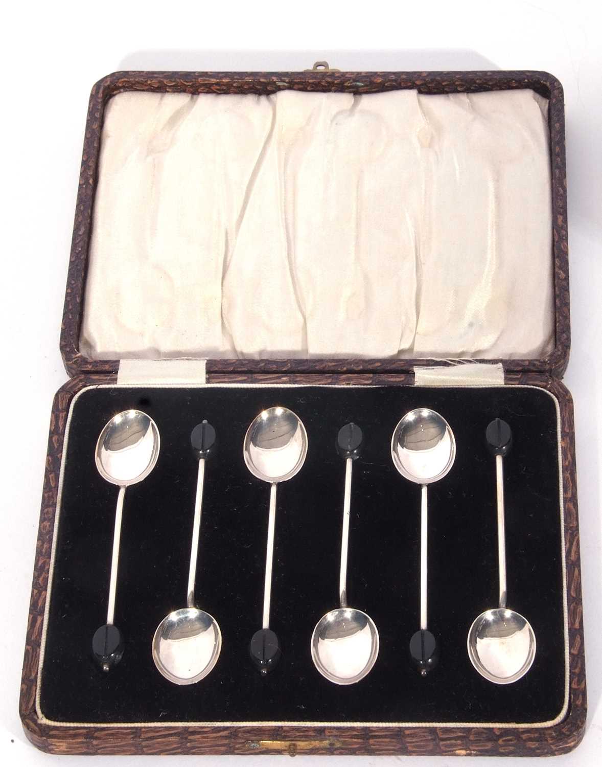 Lot 202 - Cased George V set of six silver bean end...