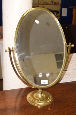 Lot 842 - Brass framed oval dressing table mirror