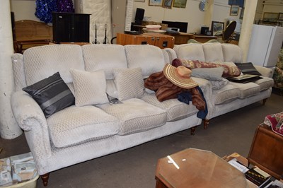 Lot 858 - A pair of three seater sofas and cushions