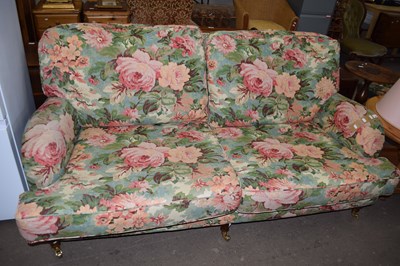 Lot 863 - A floral upholstered sofa